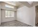 Inviting bedroom with plank floors, neutral paint, plantation shutters and large windows at 2824 Dry Plains Dr, Las Vegas, NV 89134