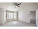 Bright bedroom boasts vaulted ceiling, ceiling fan, big windows with shutter blinds and ensuite at 2824 Dry Plains Dr, Las Vegas, NV 89134
