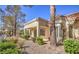 Exterior of a home with a tiled roof and desert landscaping at 2824 Dry Plains Dr, Las Vegas, NV 89134