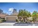 Charming single-story home with a desert landscape, attached garage, and welcoming curb appeal at 2824 Dry Plains Dr, Las Vegas, NV 89134