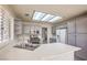 Bright kitchen featuring gray cabinets, white countertops, and stainless steel appliances at 2824 Dry Plains Dr, Las Vegas, NV 89134