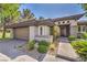 Well-maintained single Gathering home boasting manicured landscaping and a two-car garage at 3 Glendora Ct, Henderson, NV 89052