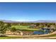 Scenic view of the community golf course, featuring lush green fairways and a tranquil pond at 3 Glendora Ct, Henderson, NV 89052