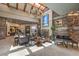 Elegant lobby featuring stone accents, a fireplace, a skylight and comfortable seating at 3 Glendora Ct, Henderson, NV 89052