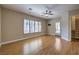 Spacious main bedroom features hardwood floors, ceiling fan, walk-in closet, and backyard access at 3 Glendora Ct, Henderson, NV 89052
