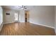 Relax in this spacious main bedroom with hardwood floors, a ceiling fan, and natural light at 3 Glendora Ct, Henderson, NV 89052