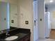 Bathroom featuring dark vanity and granite countertop at 30 Strada Di Villaggio # 631, Henderson, NV 89011