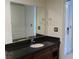 Bathroom vanity featuring granite countertop at 30 Strada Di Villaggio # 631, Henderson, NV 89011