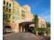 Beautifully landscaped entrance to a condo building with portico at 30 Strada Di Villaggio # 631, Henderson, NV 89011