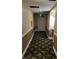 Hallway with neutral color palette and decorative details at 30 Strada Di Villaggio # 631, Henderson, NV 89011