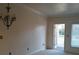 Unfurnished living room with balcony access at 30 Strada Di Villaggio # 631, Henderson, NV 89011