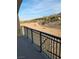 Beautiful outdoor view from a wrought-iron balcony, showcasing nearby landscapes and terrain at 30 Strada Di Villaggio # 631, Henderson, NV 89011