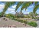 Spacious backyard featuring desert landscaping, a rock garden, and a wrought iron fence for beautiful outdoor living at 3051 Scotts Valley Dr, Henderson, NV 89052