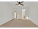 Spacious bedroom with neutral carpet and adjoining bathroom access for convenience at 3051 Scotts Valley Dr, Henderson, NV 89052