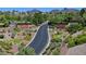 Welcoming community entrance with elegant signage and lush desert landscaping at 3051 Scotts Valley Dr, Henderson, NV 89052