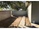 Backyard featuring a block wall, concrete patio area and simple landscaping at 3258 Glenhurst Dr, Las Vegas, NV 89121