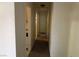 Hallway with neutral paint and carpet leading to other rooms at 3258 Glenhurst Dr, Las Vegas, NV 89121
