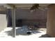 Covered patio features a ceiling fan and plenty of room for entertaining at 33 Newburg Ave, North Las Vegas, NV 89032