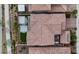 Top-down view of roof and backyard with pergola, turf and patio areas in a desert residential neighborhood at 342 Molinetto St, Las Vegas, NV 89138