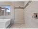 Large shower area with tile surround in bright bathroom with soaking tub at 342 Molinetto St, Las Vegas, NV 89138