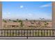 A daytime neighborhood and city view from a home's balcony at 342 Molinetto St, Las Vegas, NV 89138