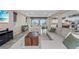Bright living room featuring large windows, an open layout, and stylish furnishings at 342 Molinetto St, Las Vegas, NV 89138