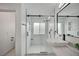 Sleek bathroom design with a walk-in shower featuring a glass door and modern fixtures at 345 Templeton Dr, Henderson, NV 89074