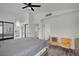 This bedroom features neutral walls, wood-look flooring, and a ceiling fan at 345 Templeton Dr, Henderson, NV 89074