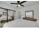 This bedroom features wood-look floors and a queen bed at 345 Templeton Dr, Henderson, NV 89074