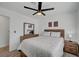 This bedroom features a queen bed, wood-look flooring, and neutral walls at 345 Templeton Dr, Henderson, NV 89074