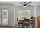Casual breakfast nook with backyard access, a ceiling fan, and a view of the outdoor patio at 345 Templeton Dr, Henderson, NV 89074
