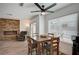 Cozy breakfast nook with a view of a stone fireplace at 345 Templeton Dr, Henderson, NV 89074