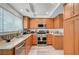 Well-equipped kitchen with stainless steel appliances, countertops, and ample cabinetry at 345 Templeton Dr, Henderson, NV 89074