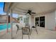This covered patio provides an outdoor space with seating and pool views at 345 Templeton Dr, Henderson, NV 89074