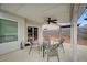 The covered patio includes outdoor seating and access to the backyard at 345 Templeton Dr, Henderson, NV 89074