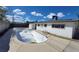 Wide backyard featuring an empty in ground pool and ladder at 3749 Ponderosa Ave, Las Vegas, NV 89115