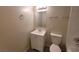 Clean bathroom featuring a new vanity, a round towel rack, and modern fixtures at 3749 Ponderosa Ave, Las Vegas, NV 89115