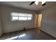 Updated bedroom with ceiling fan and window offering great natural lighting and space at 3749 Ponderosa Ave, Las Vegas, NV 89115