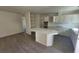 Bright kitchen flows into an open floor plan, boasting updated countertops, stainless appliances, and ample cabinet space at 3749 Ponderosa Ave, Las Vegas, NV 89115
