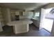 Bright kitchen flows into an open floor plan, boasting updated countertops, stainless appliances, and ample cabinet space at 3749 Ponderosa Ave, Las Vegas, NV 89115