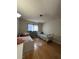 Bedroom with hard wood floors, twin beds and a window with curtains at 3813 Marshall Cir, Las Vegas, NV 89108