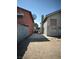 Side view of property featuring a driveway with access to the backyard at 3813 Marshall Cir, Las Vegas, NV 89108