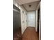 Hallway with a white wall and tiled floor at 3813 Marshall Cir, Las Vegas, NV 89108