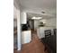 Compact kitchen design with a tile floor and wooden countertops at 3813 Marshall Cir, Las Vegas, NV 89108