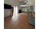Bright living room featuring tile floors, large windows, a sofa and media center at 3813 Marshall Cir, Las Vegas, NV 89108