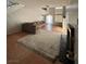 Bright living room featuring tile floors, fireplace and a large sofa at 3813 Marshall Cir, Las Vegas, NV 89108