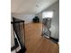 Upstairs loft area featuring wood-look flooring and workstation at 3813 Marshall Cir, Las Vegas, NV 89108