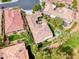 Overhead shot of a home featuring mature landscaping, a stone patio, and a refreshing pool area at 4 Annadale Ct, Henderson, NV 89052