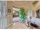 Welcoming foyer with neutral tones, decorative accents, and arched doorway leading to living spaces at 4 Annadale Ct, Henderson, NV 89052