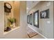Cozy hallway with art, plants, decor, and carpet runner at 4 Annadale Ct, Henderson, NV 89052
